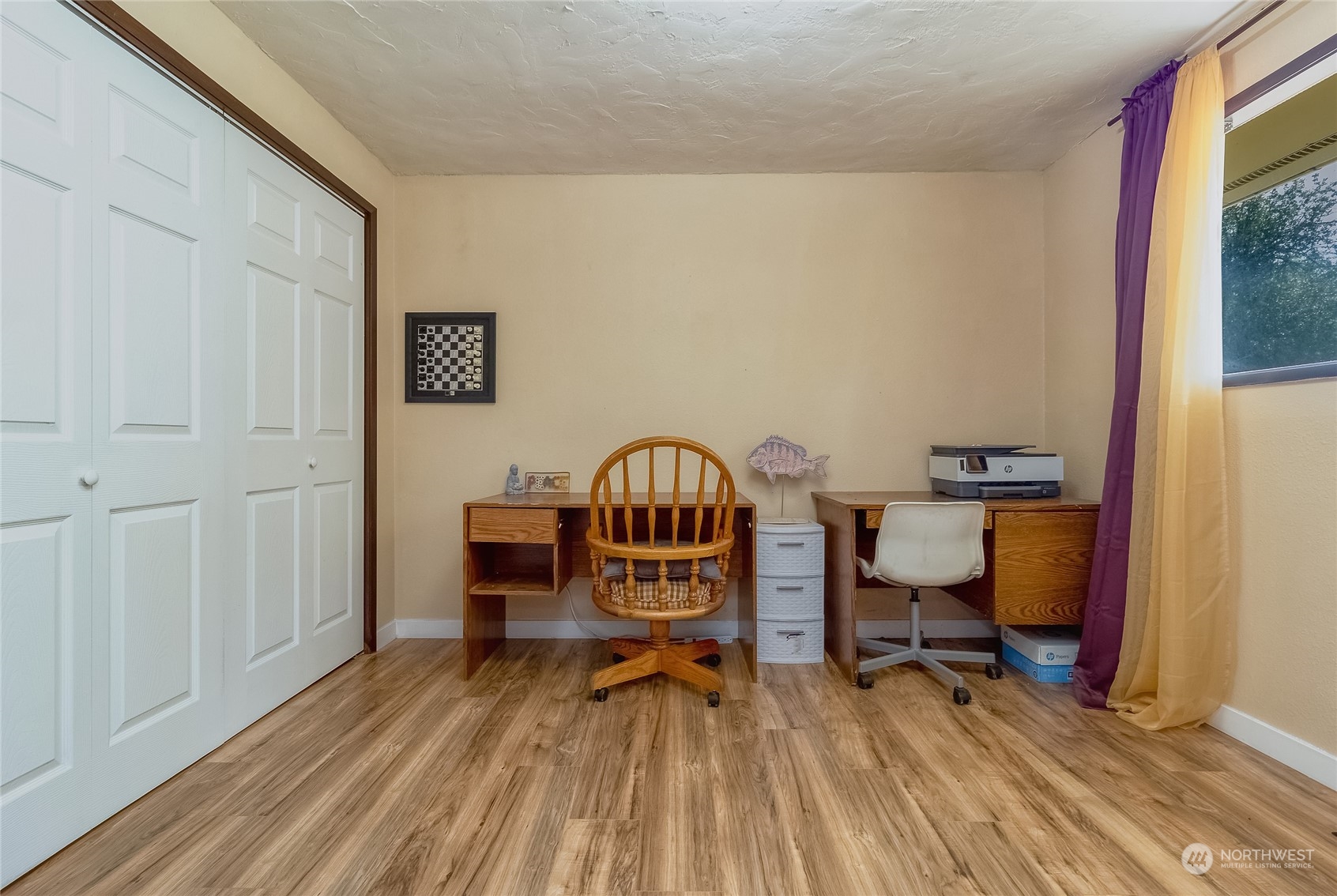 326 Harrison Street Walla Walla, WA 99362 - Photo 22 of 28 a view of a workspace with furniture and a window