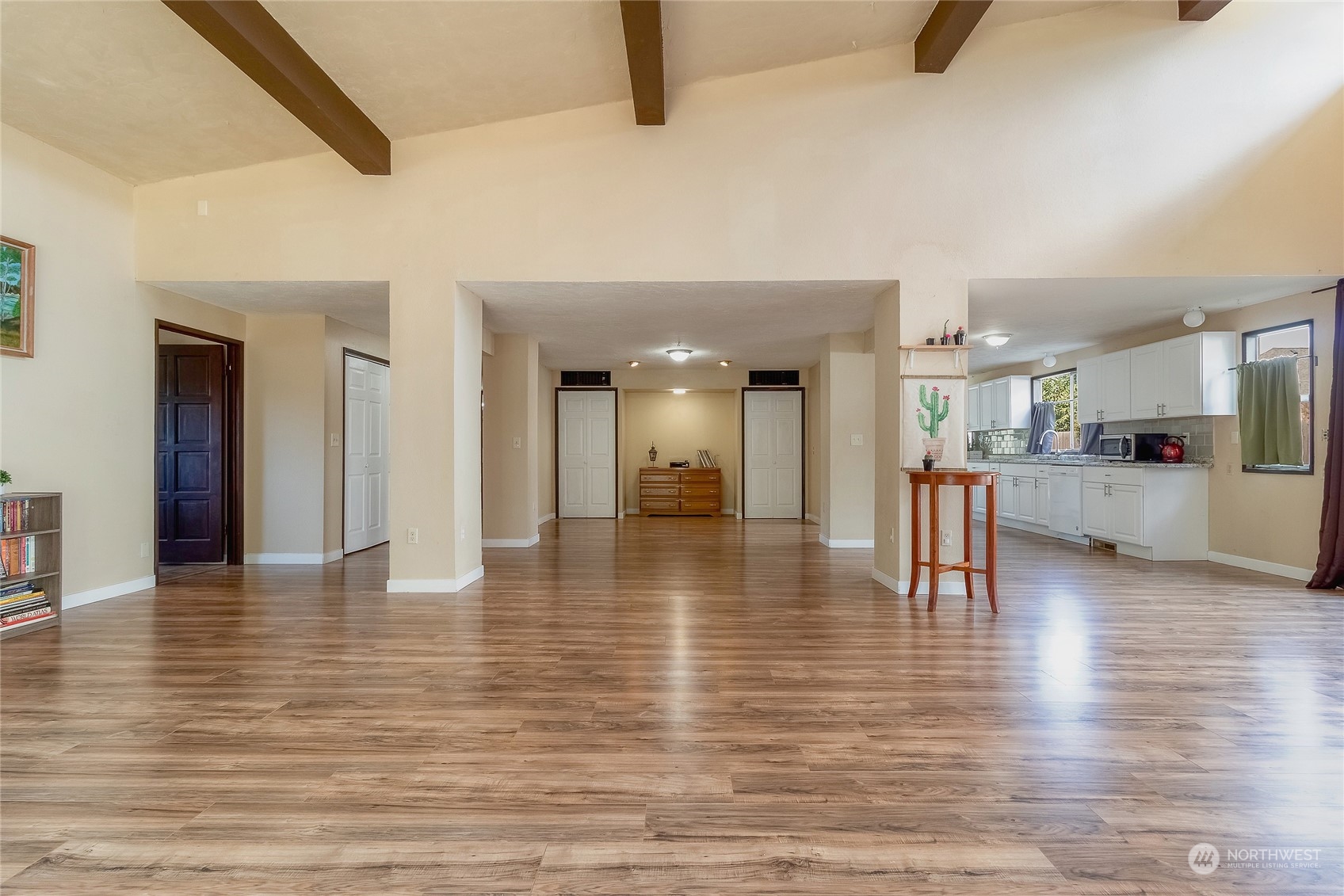 326 Harrison Street Walla Walla, WA 99362 - Photo 6 of 28 a view of a hallway with wooden floor and a kitchen