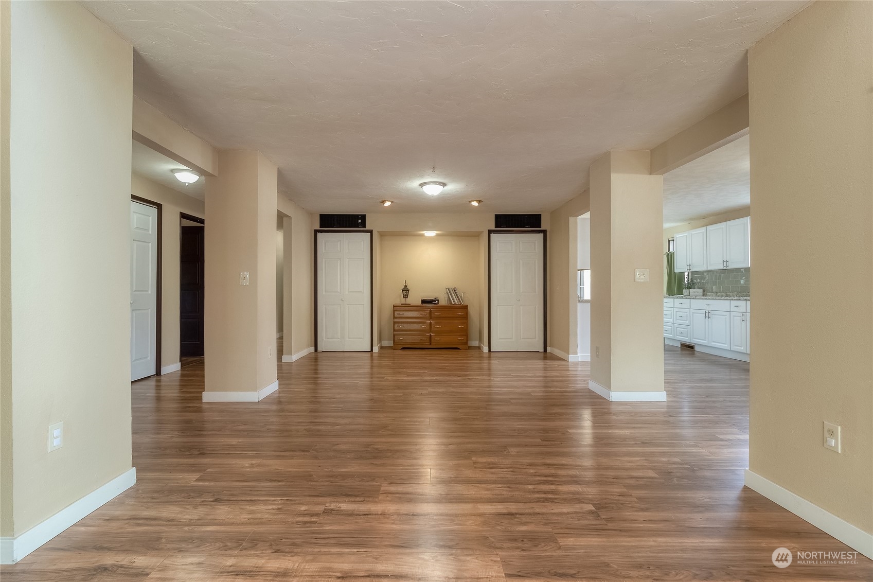 326 Harrison Street Walla Walla, WA 99362 - Photo 7 of 28 a view of an empty room and wooden floor