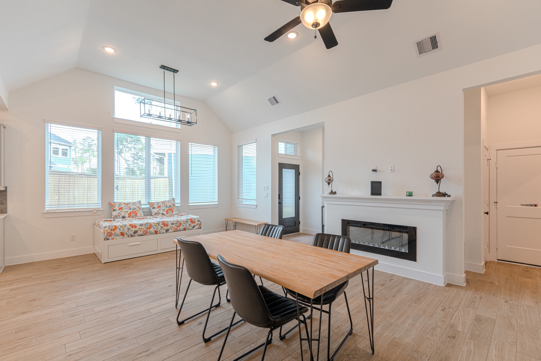 214 Prairie Rose Court Conroe, TX 77318 - Photo 8 of 30 a living room with furniture fireplace and window