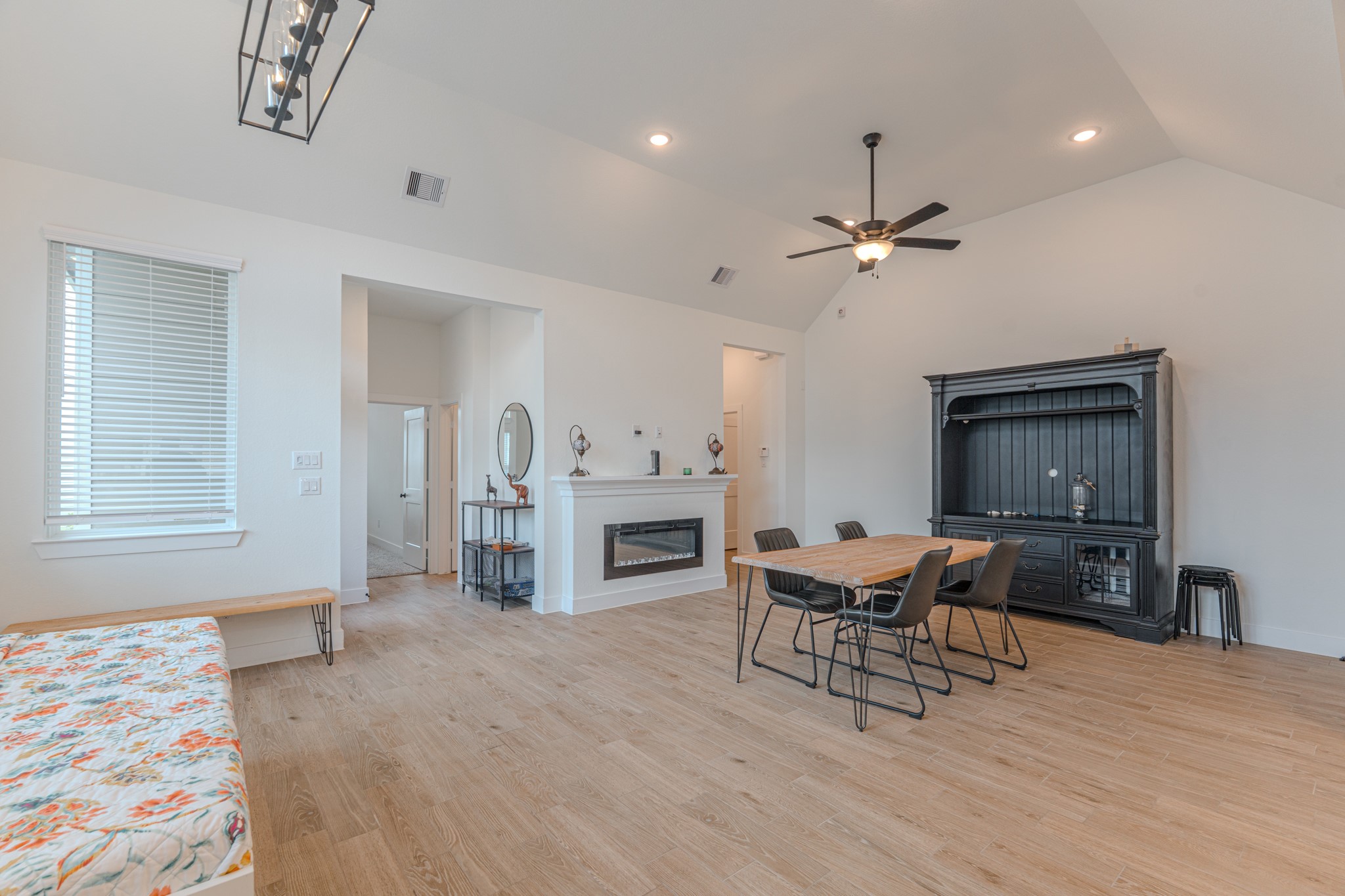 214 Prairie Rose Court Conroe, TX 77318 - Photo 10 of 30 a living room with furniture and fireplace