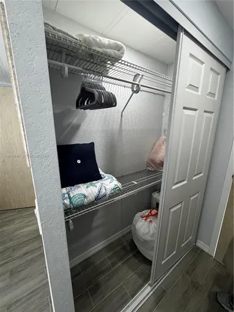 a room with water heater and storage