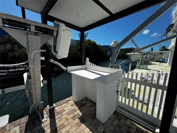 a view of a balcony with chairs