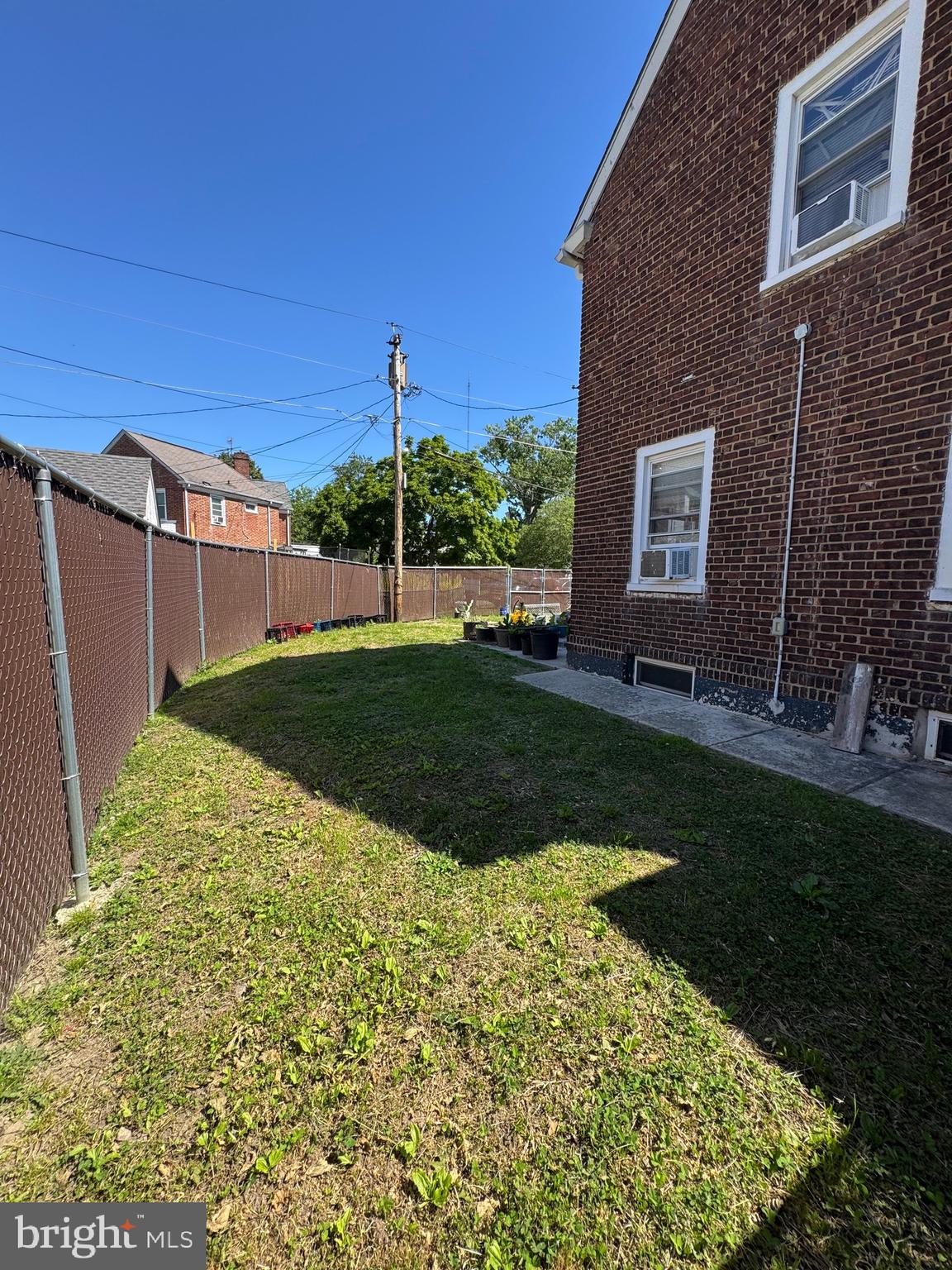 1515 Collings Road Camden, NJ 08104 - Photo 21 of 23 a view of a backyard with a garden and plants