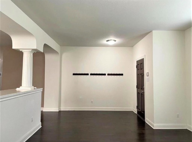 508 Tyree Road Cedar Park, TX 78613 - Photo 6 of 22 an empty room with wooden floor and a window
