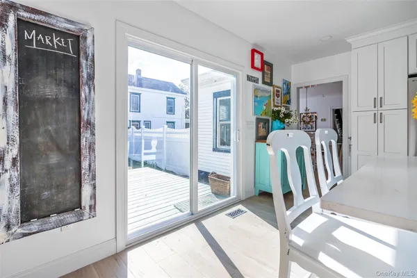 swimming pool view with a seating space