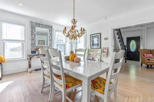 a view of kitchen with furniture wooden floor and window