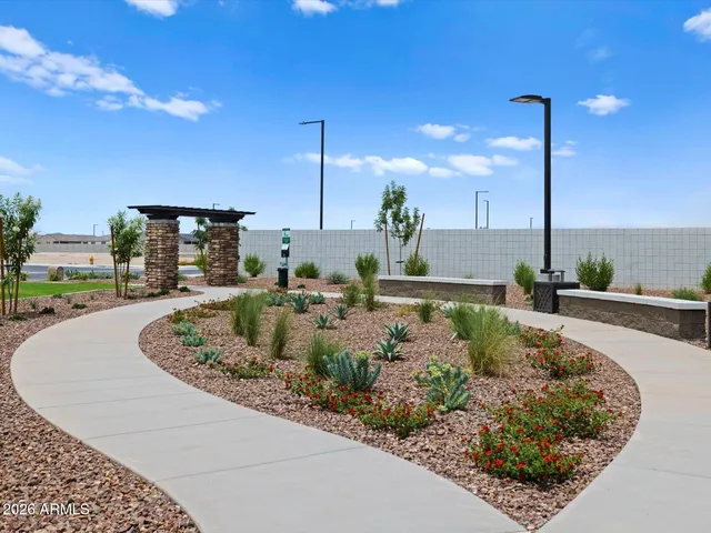 a view of a swimming pool with a yard