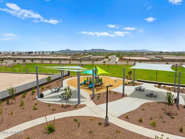 a view of swimming pool with outdoor seating