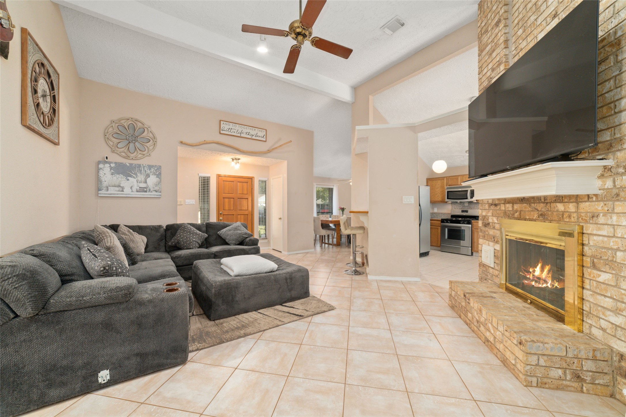 3315 Haydee Road Spring, TX 77388 - Photo 8 of 29 a living room with furniture and a fireplace