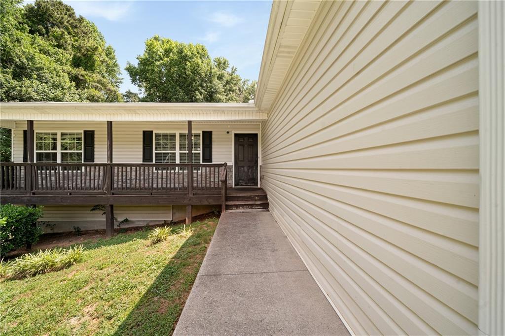 921 Pace Road Hiram, GA 30141 - Photo 3 of 41 a view of house with a yard