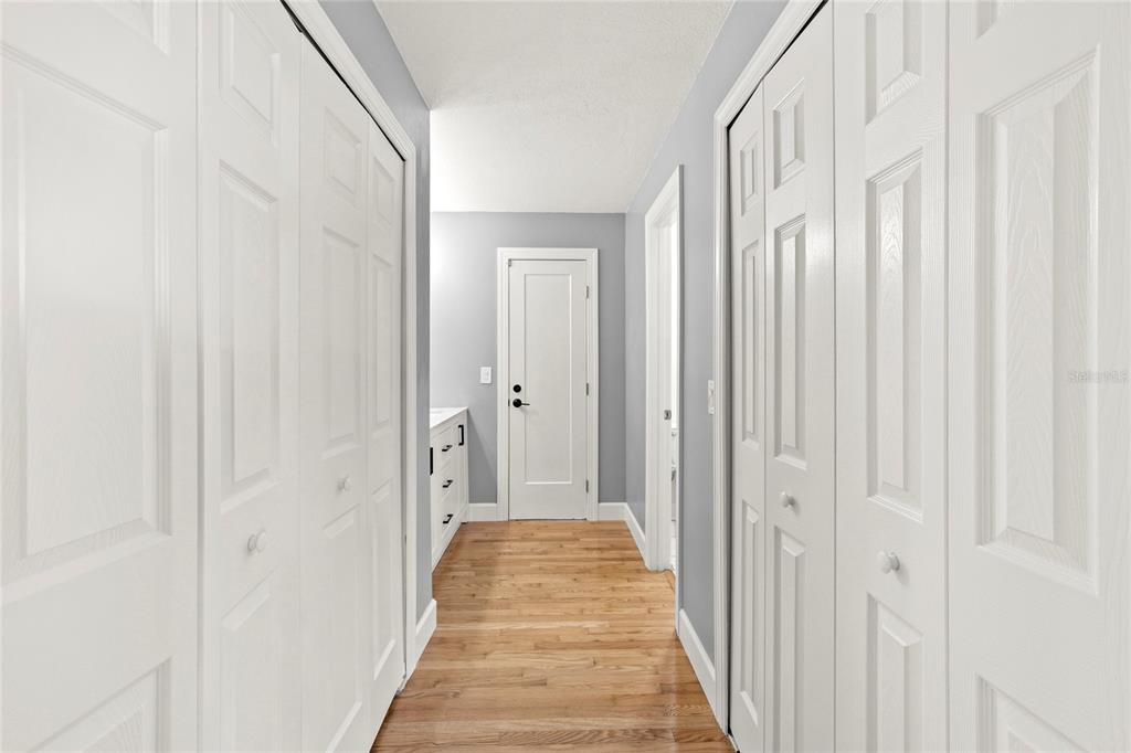 9508 Pine Terrace Court Windermere, FL 34786 - Photo 20 of 37 a view of a hallway with wooden floor and closet
