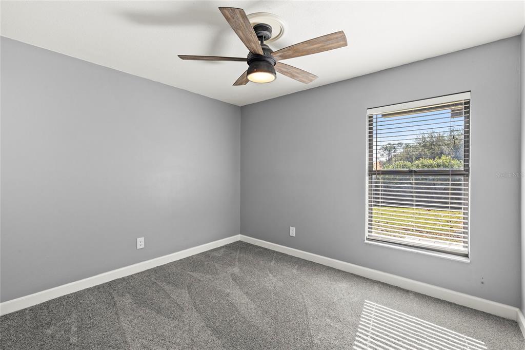 9508 Pine Terrace Court Windermere, FL 34786 - Photo 26 of 37 a view of an empty room with a window