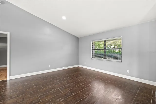 an empty room with windows