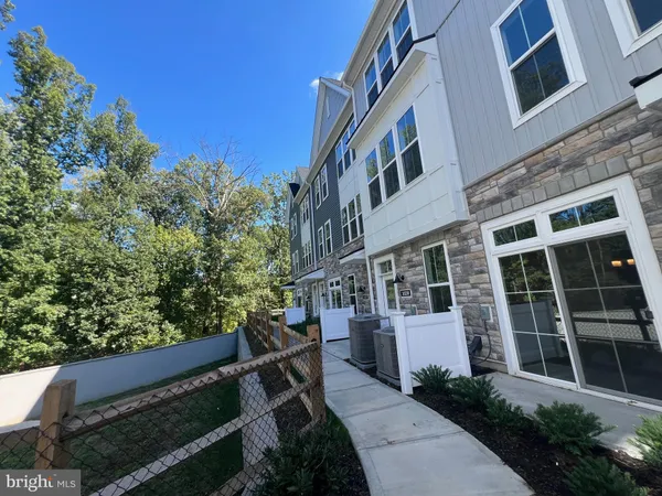 a view of a building with a yard