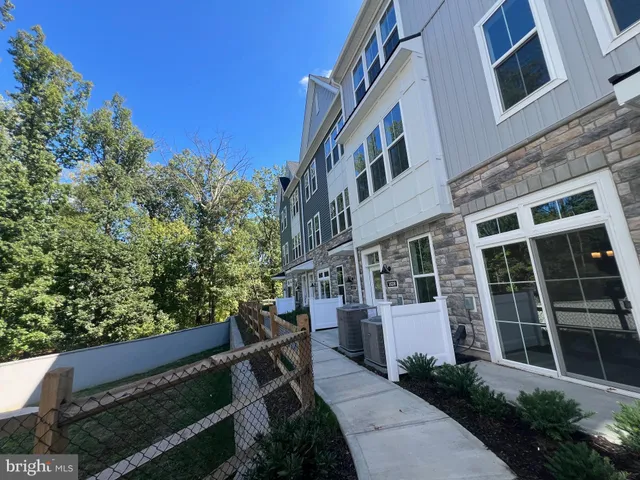 a view of a building with a yard