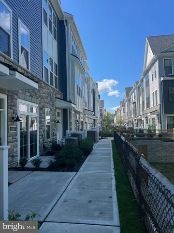 a view of a building next to a yard
