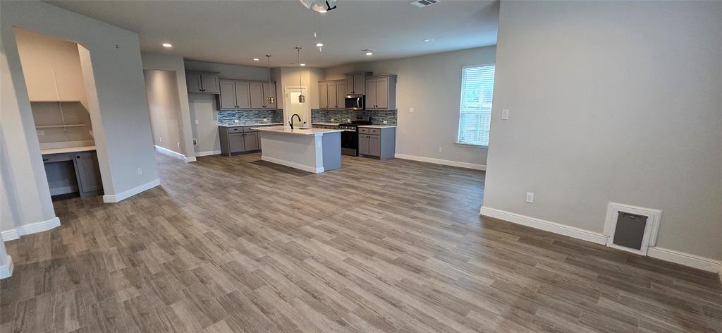 2432 O'Connor Rnch Drive Weatherford, TX 76087 - Photo 20 of 20 a view of kitchen view wooden floor and stainless steel appliances