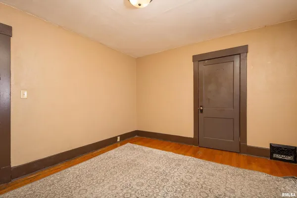 a view of small space with wooden floor