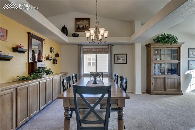 12022 Rio Secco Road Peyton, CO 80831 - Photo 5 of 26 Formal Dining Room with Built-in Cabinets for Additional Storage and/or Serving Space