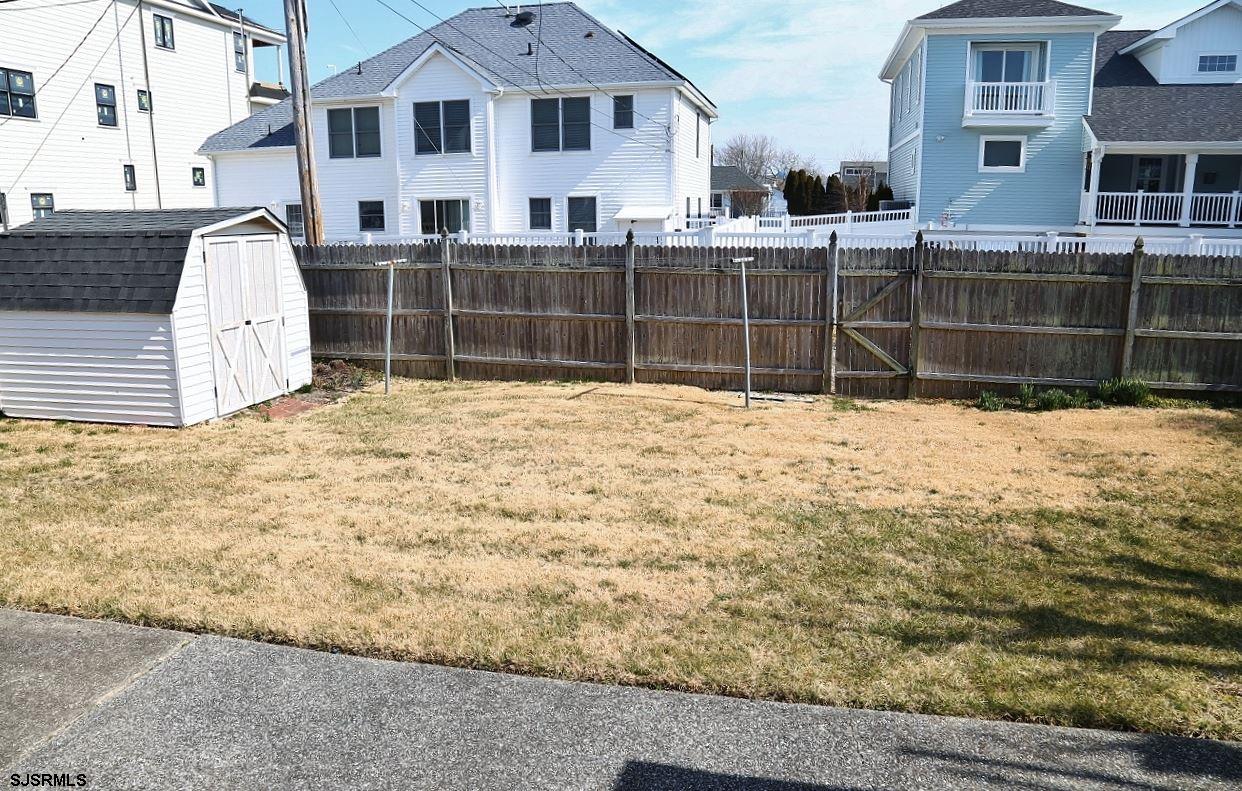 215 27th Street South Brigantine, NJ 08203 - Photo 14 of 23 a view of a house with a yard