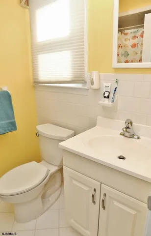 a bathroom with a sink and a toilet