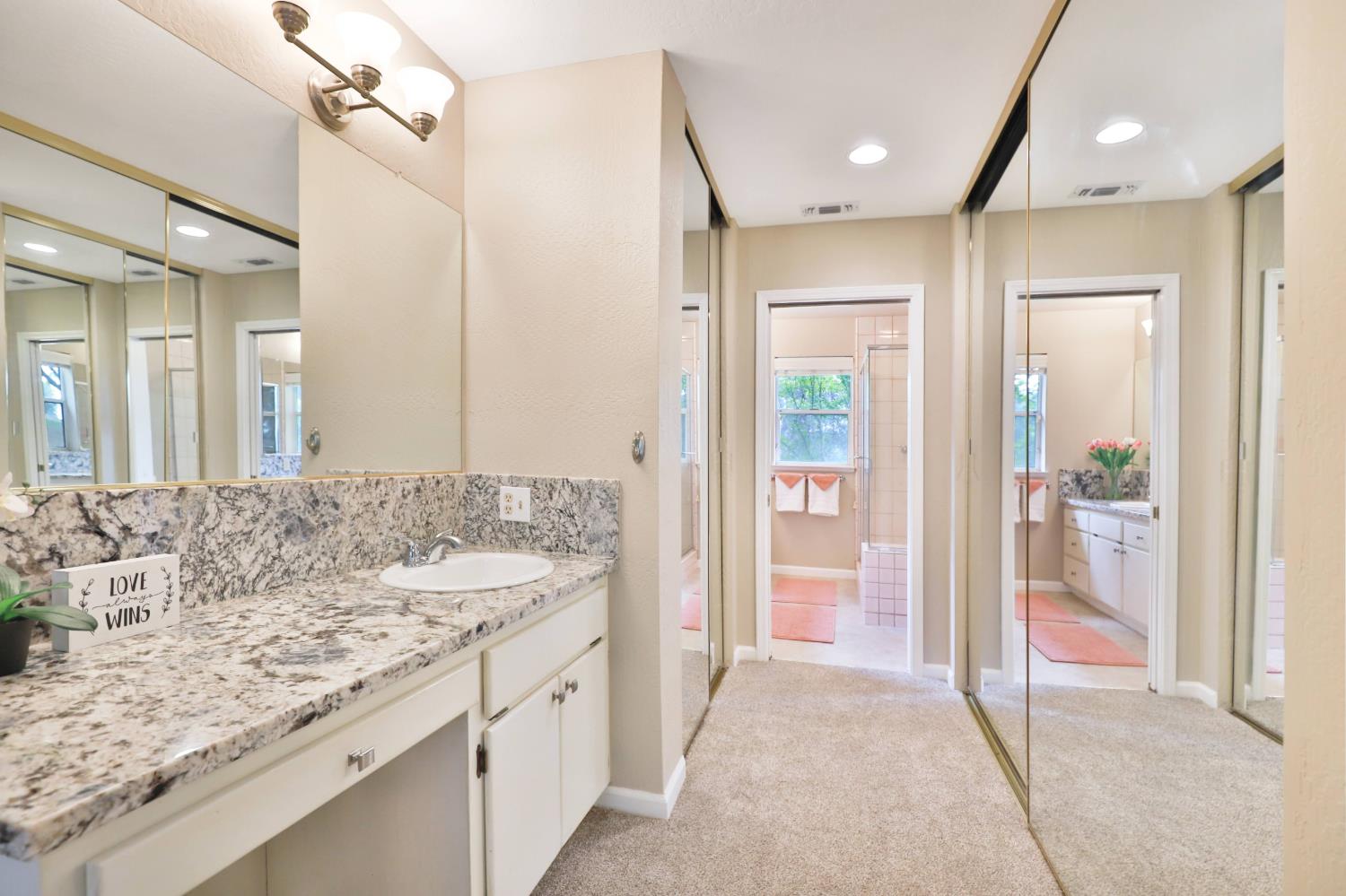 4773 Jacarah Road Placerville, CA 95667 - Photo 32 of 94 Master bath features separate sinks with closets in between.