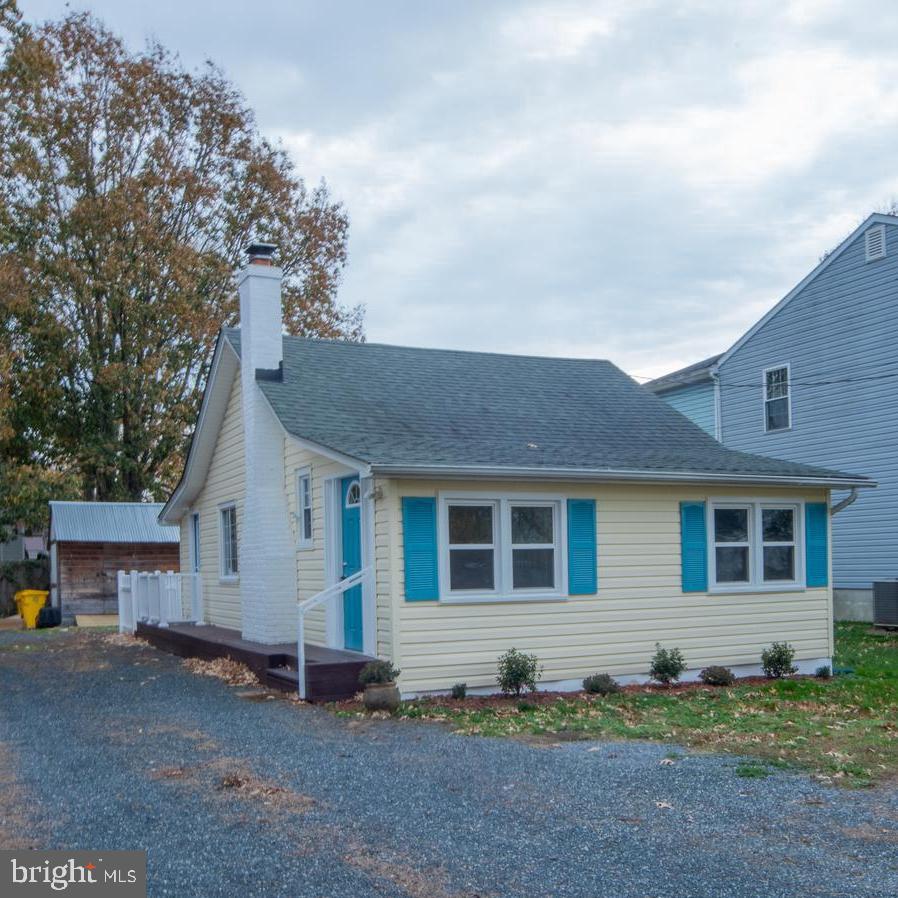 4955 Chestnut Street Shady Side, MD 20764 - Photo 1 of 22 a house view with a backyard space