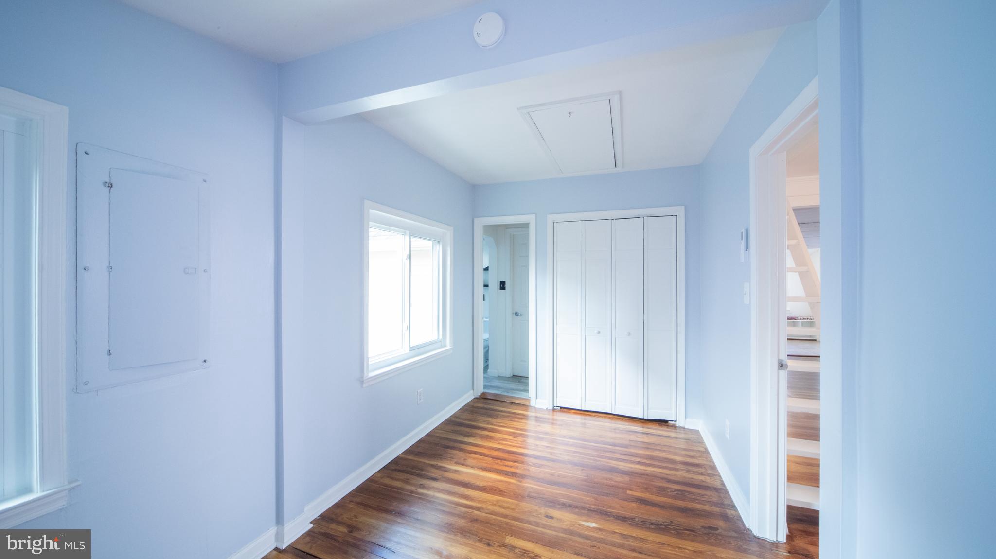 4955 Chestnut Street Shady Side, MD 20764 - Photo 13 of 22 a view of hallway with wooden floor