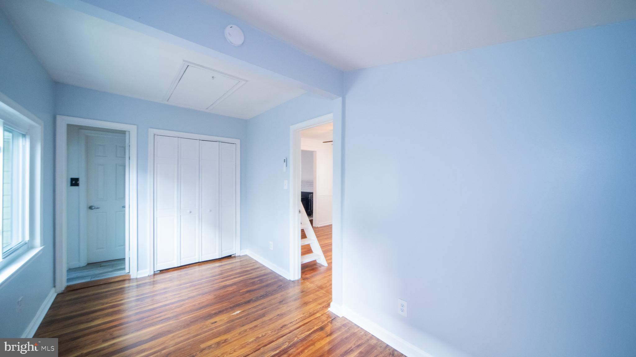 4955 Chestnut Street Shady Side, MD 20764 - Photo 14 of 22 a view of empty room with wooden floor