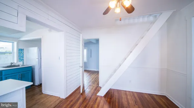 a view of entryway with wooden floor