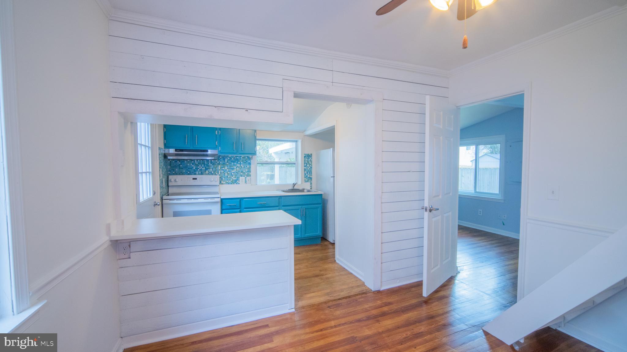 4955 Chestnut Street Shady Side, MD 20764 - Photo 5 of 22 wooden floor in an empty room