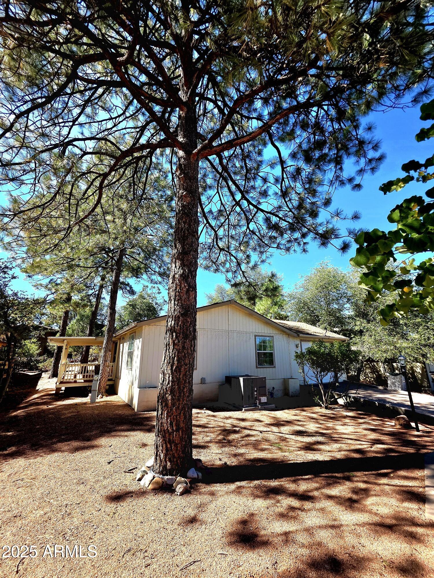 835 West Overland Road Payson, AZ 85541 - Photo 4 of 31 a view of a house with snow on the tree