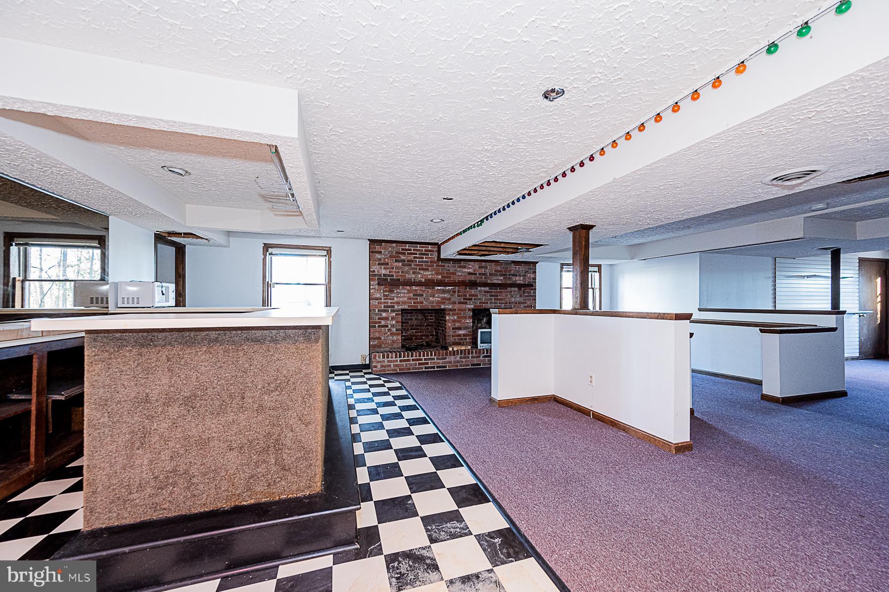 12008 Mettee Road Marriottsville, MD 21104 - Photo 23 of 36 a living room with furniture and a rug