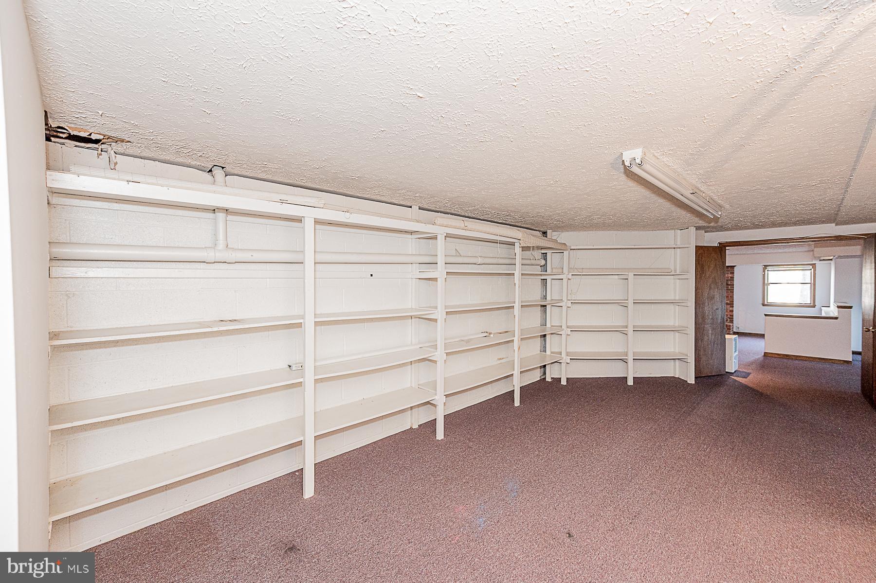 12008 Mettee Road Marriottsville, MD 21104 - Photo 29 of 36 a view of an empty room with a white walls