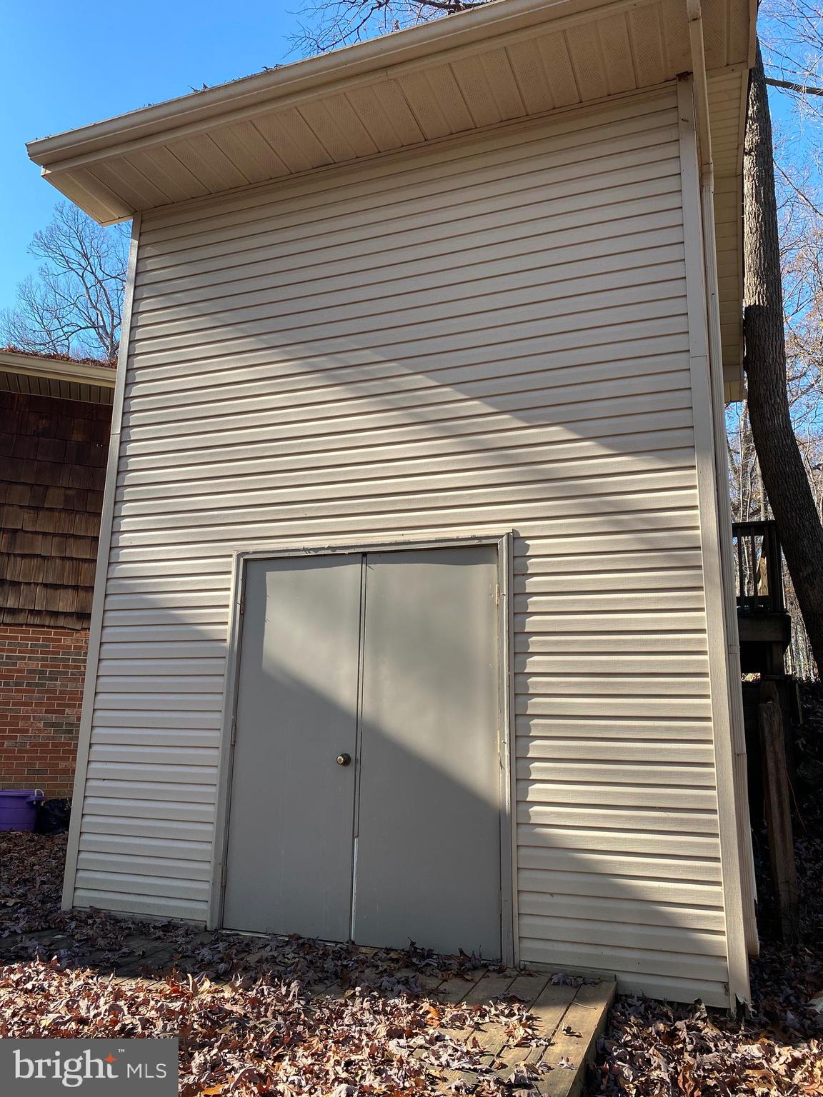 12008 Mettee Road Marriottsville, MD 21104 - Photo 33 of 36 a view of a house with a door