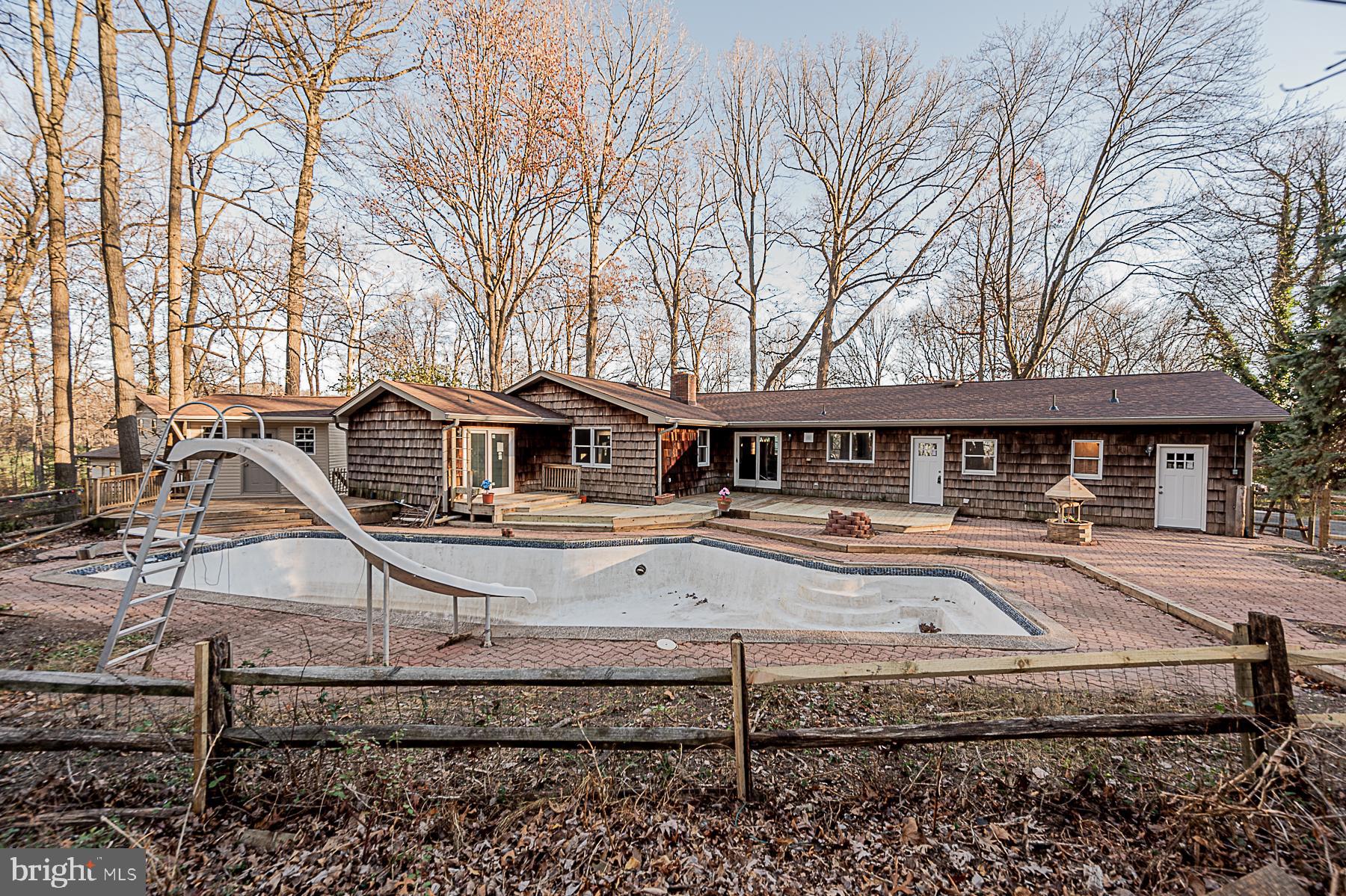 12008 Mettee Road Marriottsville, MD 21104 - Photo 36 of 36 a front view of a house with a yard