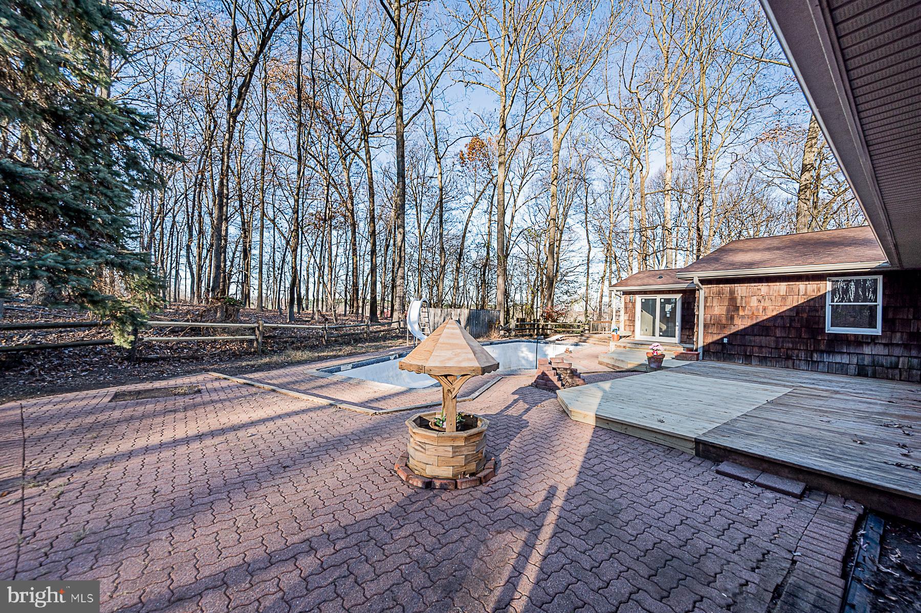 12008 Mettee Road Marriottsville, MD 21104 - Photo 8 of 36 a view of a backyard with sitting area