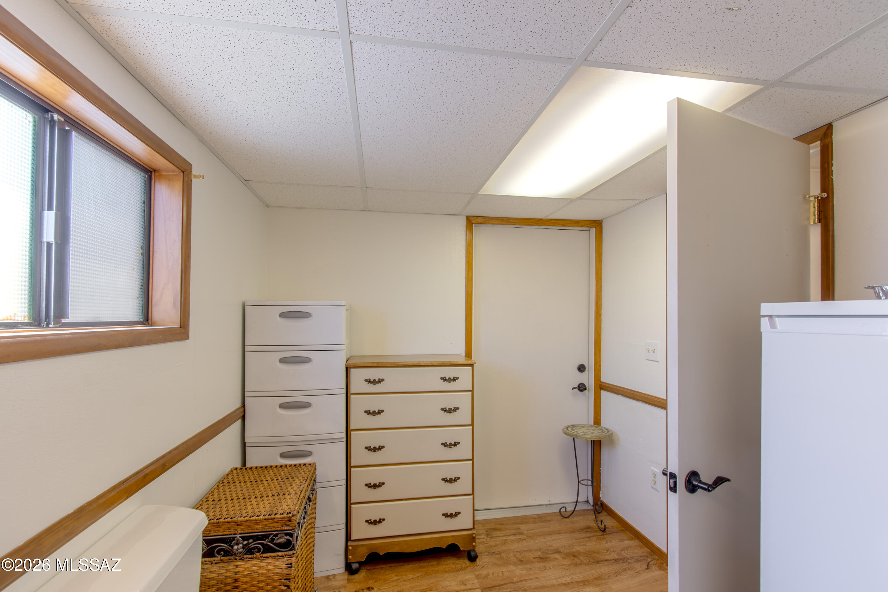 4550 North Flowing Wells Road, Unit 155 Tucson, AZ 85705 - Photo 19 of 40 a view of walk in closet with clothes