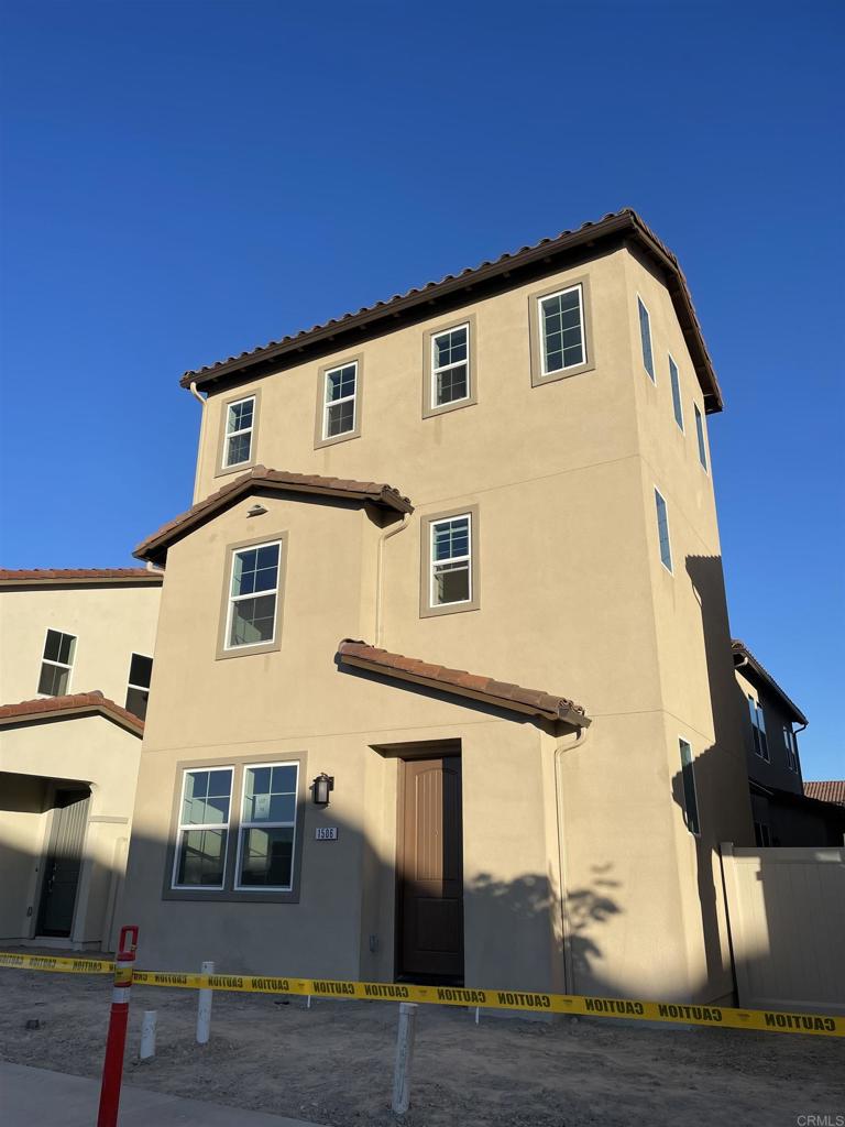 1506 Pershing Road Chula Vista, CA 91913 - Photo 2 of 5 a front view of a house with garage
