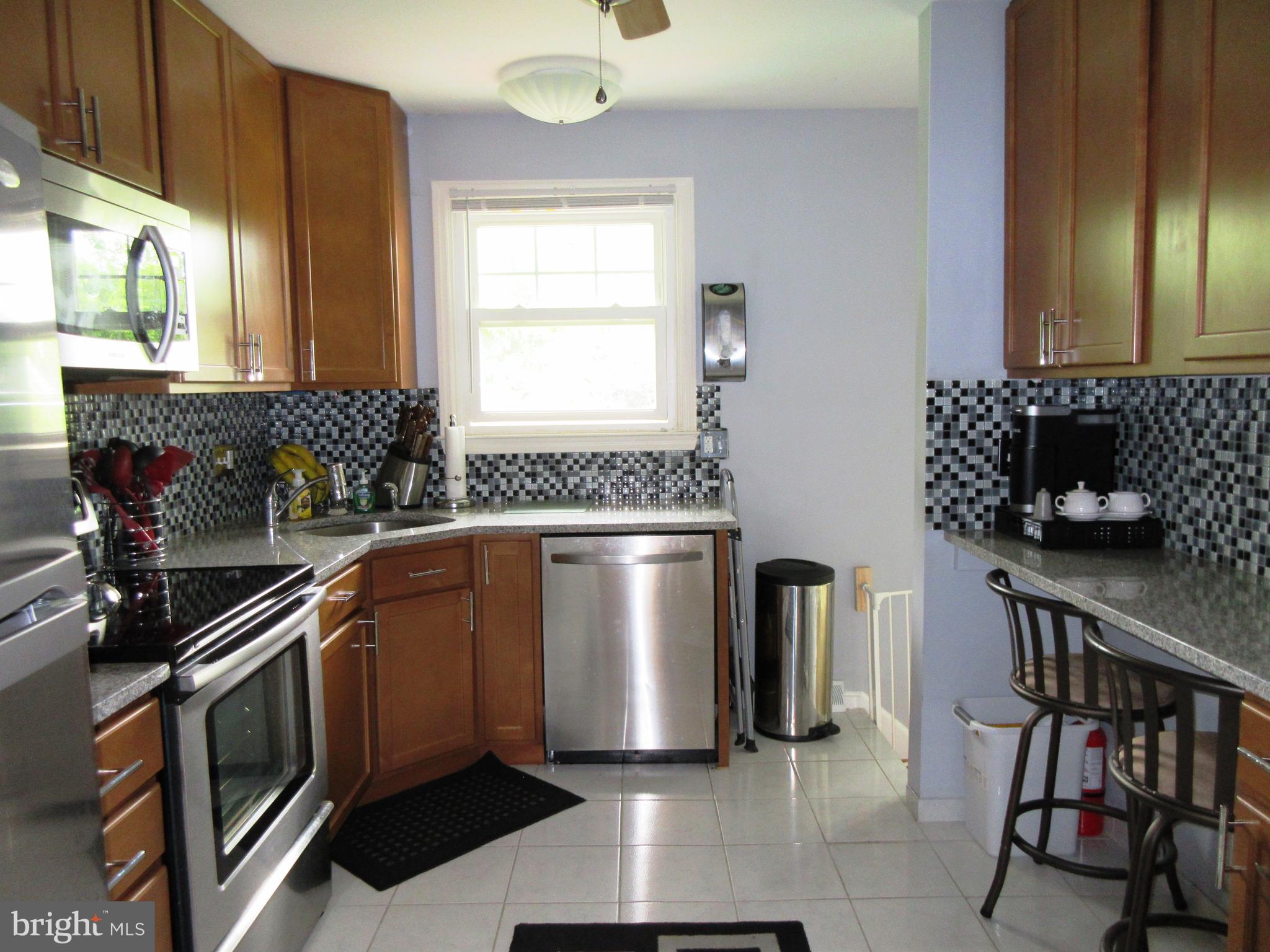 13 Cook Road Newark, DE 19711 - Photo 5 of 24 Full View of Kitchen from Center Hallway