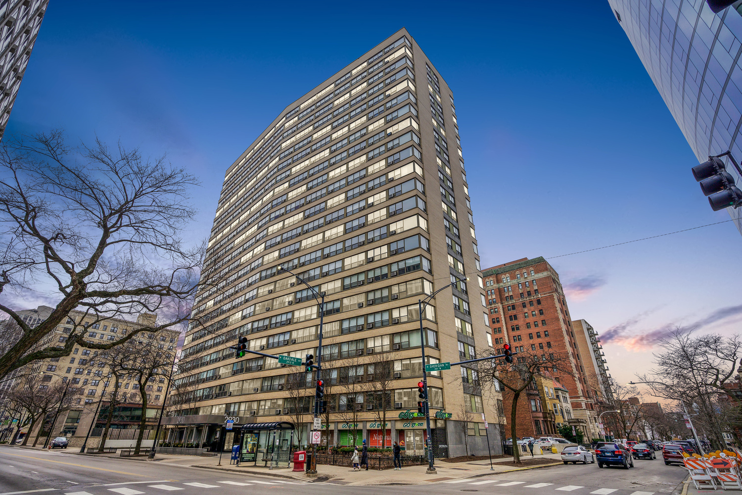 2930 North Sheridan Road, Unit 805 Chicago, IL 60657 - Photo 1 of 21 a view of a tall building next to a road