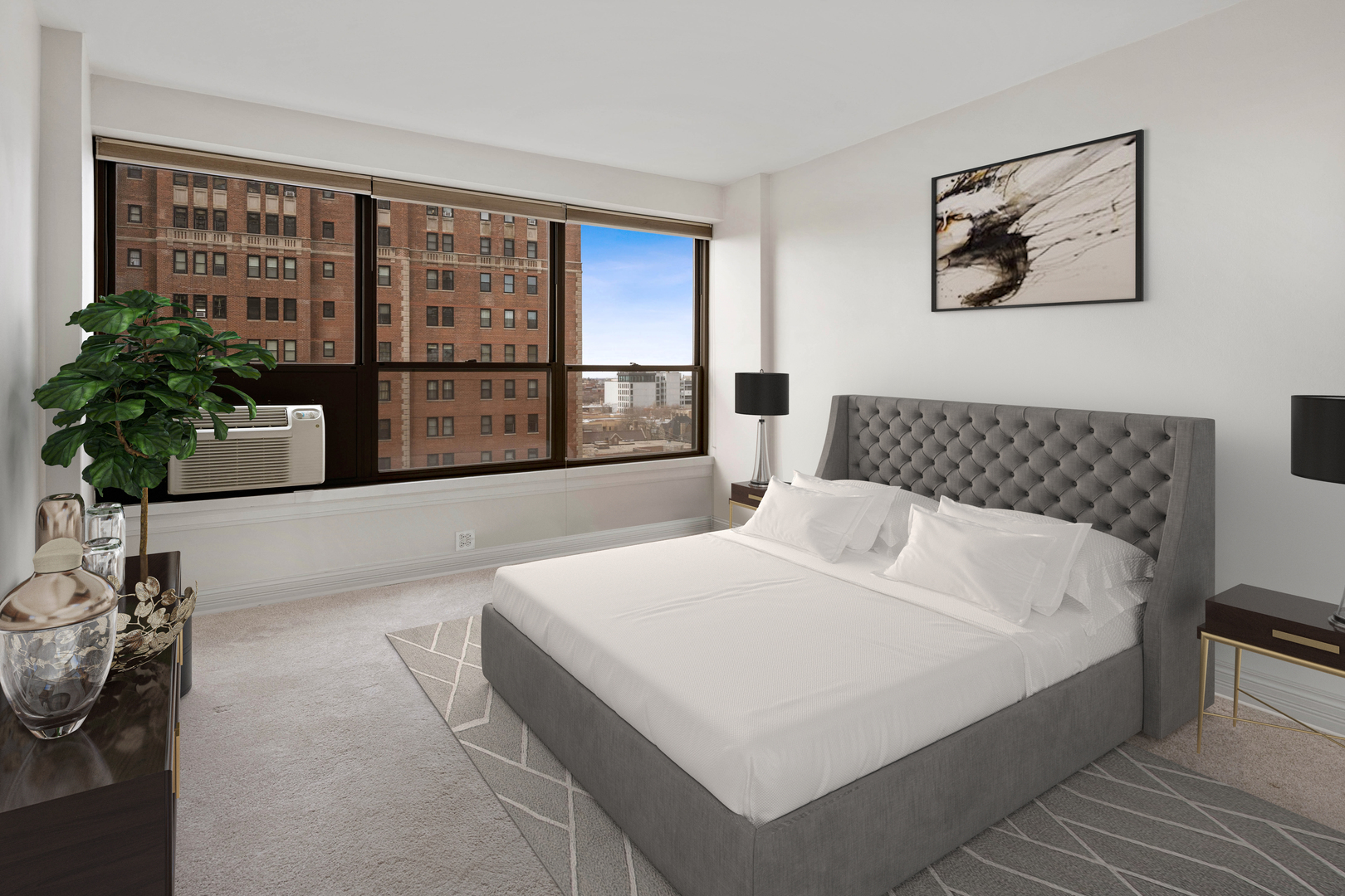 2930 North Sheridan Road, Unit 805 Chicago, IL 60657 - Photo 12 of 21 a bedroom with a large bed and a large window