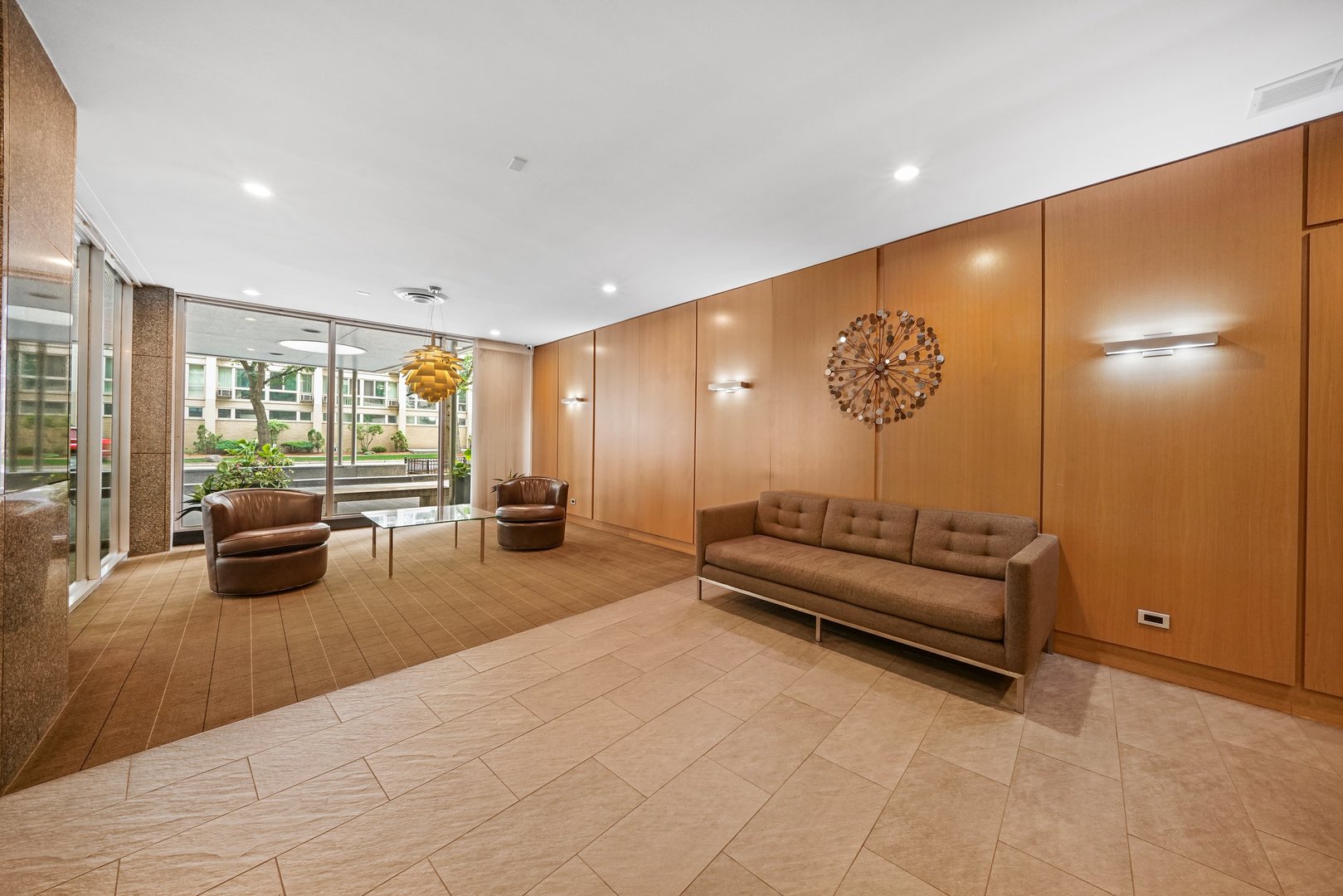 2930 North Sheridan Road, Unit 805 Chicago, IL 60657 - Photo 19 of 21 a spacious bedroom with a large bed and furniture