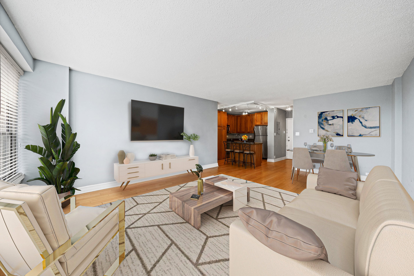 2930 North Sheridan Road, Unit 805 Chicago, IL 60657 - Photo 3 of 21 a living room with furniture and a flat screen tv