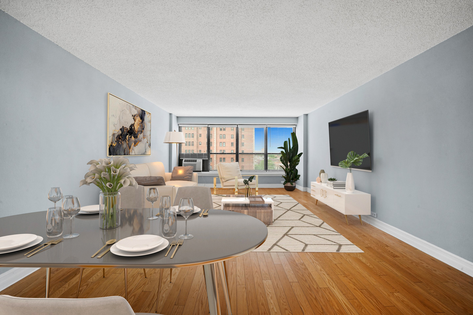 2930 North Sheridan Road, Unit 805 Chicago, IL 60657 - Photo 4 of 21 a living room with furniture and a flat screen tv