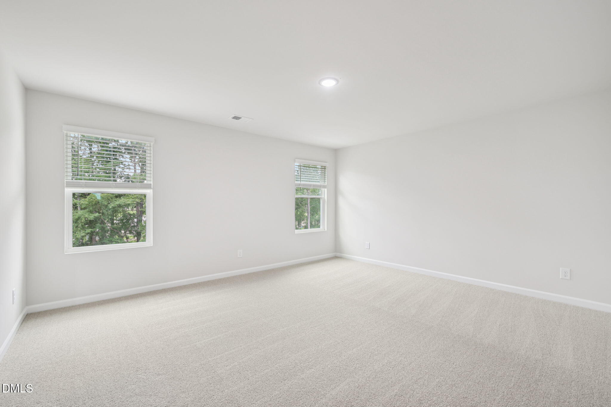 2145 Topsail Road Durham, NC 27703 - Photo 36 of 53 an empty room with windows