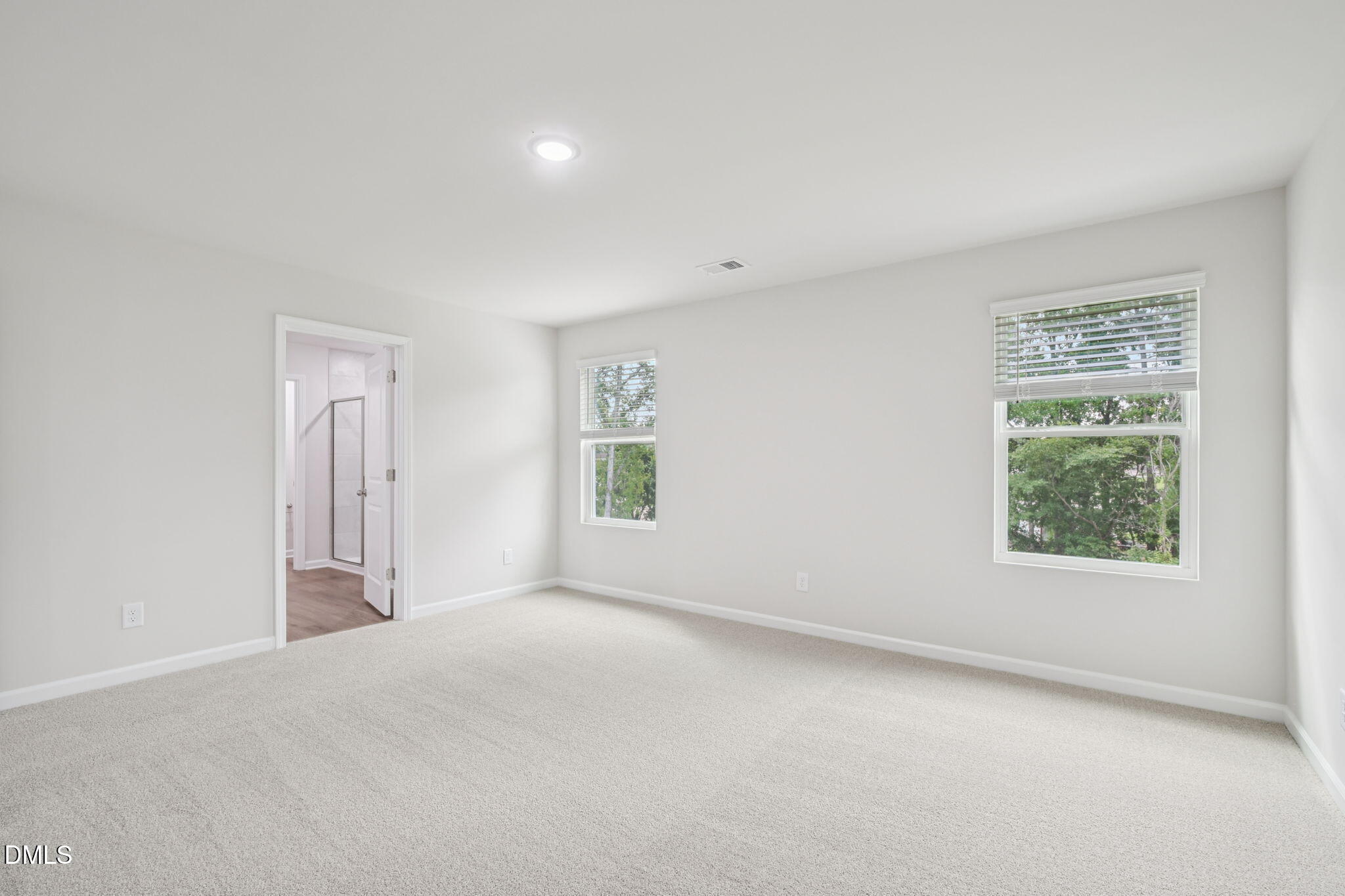 2145 Topsail Road Durham, NC 27703 - Photo 38 of 53 an empty room with windows and closet