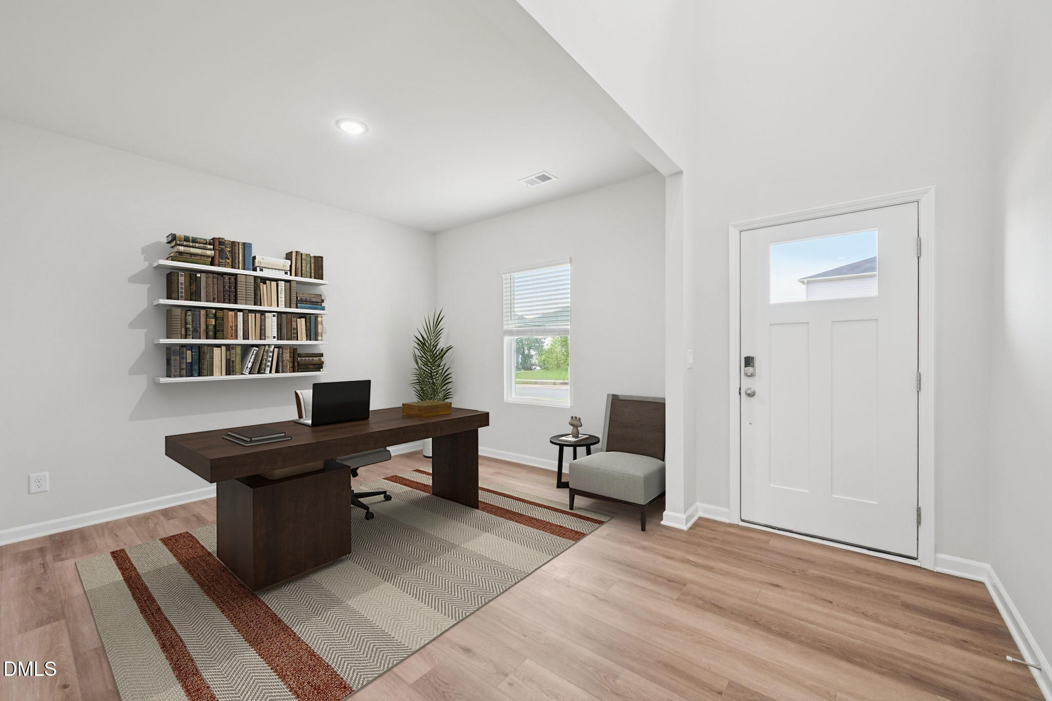 2145 Topsail Road Durham, NC 27703 - Photo 4 of 53 a view of a workspace with furniture and a window