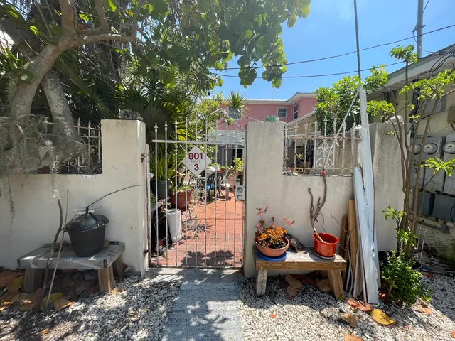 a view of a chairs and tables in patio